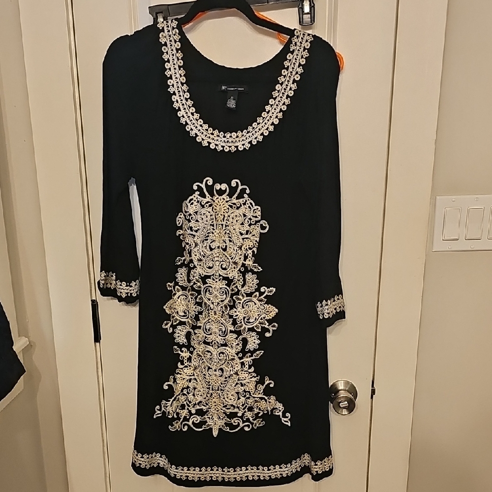Black Dress with Intricate White Embroidery